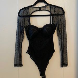 Lace bodysuit with built-in cups.